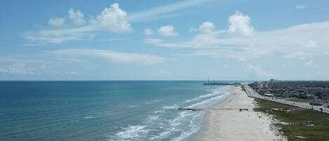 On the beach, sun-loungers