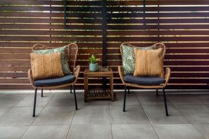 A cosy outdoor spot to sit and unwind. - `Wallaby` at Savannah House (Westcourt)