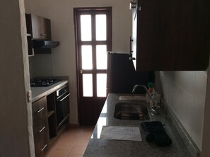 Fridge, oven, coffee/tea maker, toaster