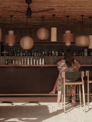 2 bars/lounges, 2 poolside bars, 2 beach bars