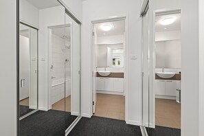 Combined shower/bathtub, hair dryer, towels, soap