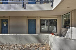 Residential building with a flat facade and balcony.