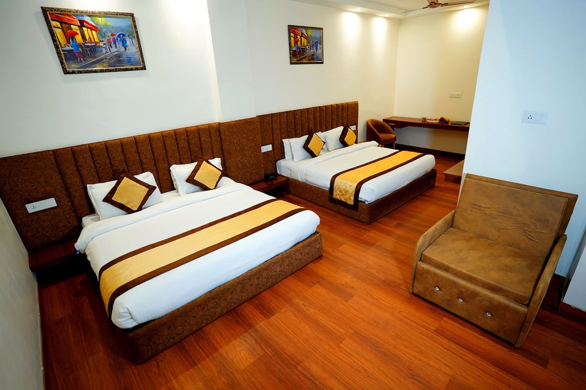 Family Room | Premium bedding, Select Comfort beds, desk, laptop workspace