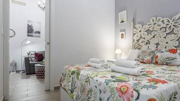 2 dormitorios, tabla de planchar con plancha, Internet y ropa de cama