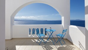 A balcony with a white arch and blue chairs, overlooking a sea view. - Villa Chryssi - Hilltop Escape w/ Endless Sea Views by etouri (Chania)