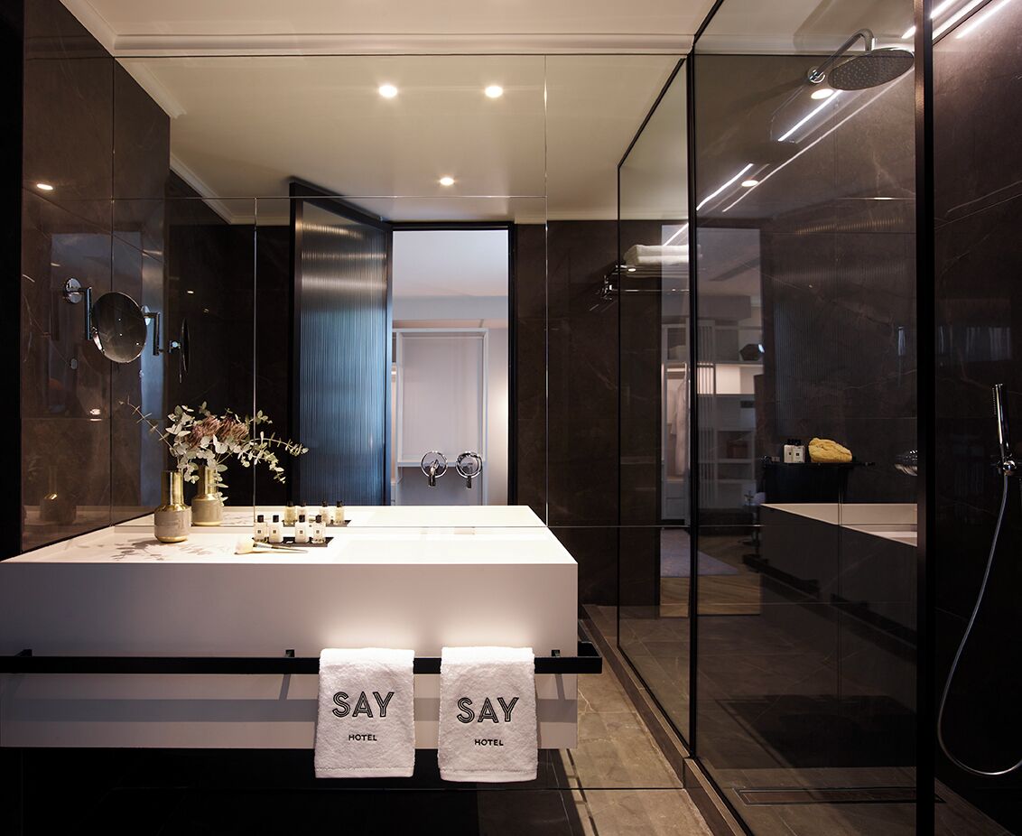executive suite | bathroom | shower, rainfall showerhead, hair dryer, bathrobes