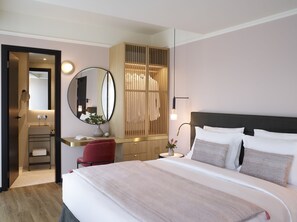 Habitación Premium con 1 cama matrimonial o 2 individuales | Ropa de cama de alta calidad y minibar 