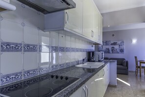 Fridge, microwave, toaster, cookware/dishes/utensils