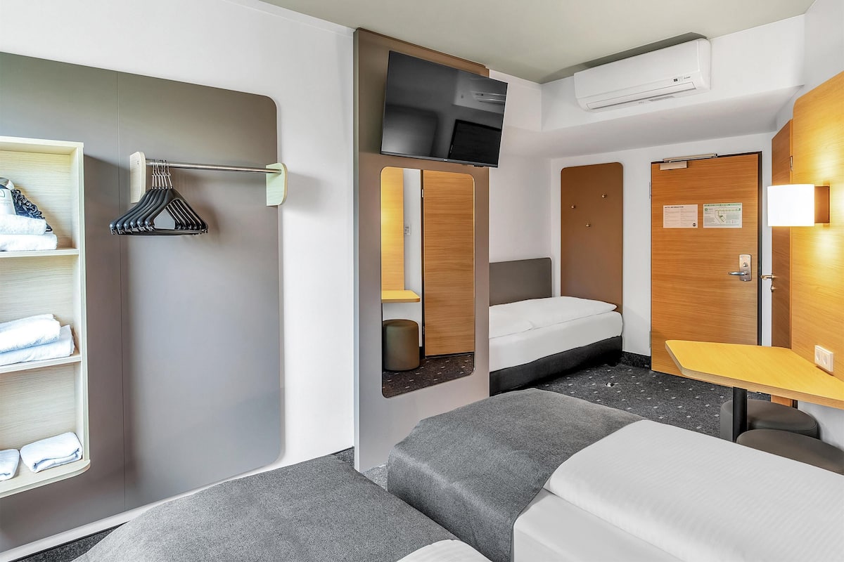 Habitació triple | 1 dormitori, escriptori, habitacions insonoritzades i wifi gratuïta