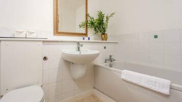 Bathtub, free toiletries, hair dryer, towels