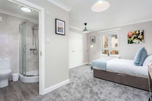 Bathtub, hair dryer, towels
