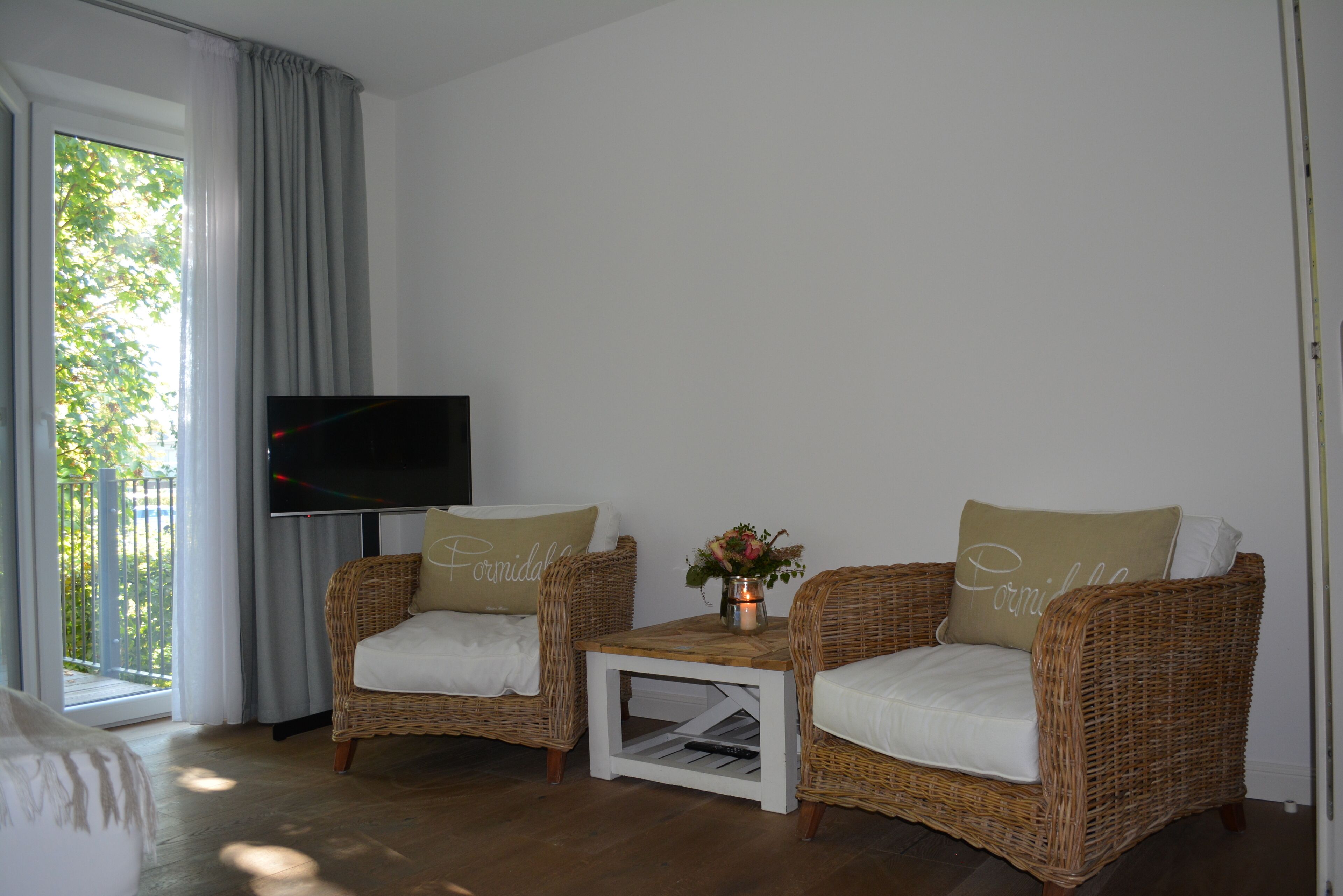 Deluxe studio suite | Woonruimte | Een flatscreentelevisie