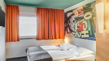 Ropa de cama hipoalergénica, escritorio y sistema de insonorización