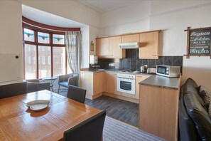 Apartment | Private kitchen | Fridge, microwave, oven, stovetop