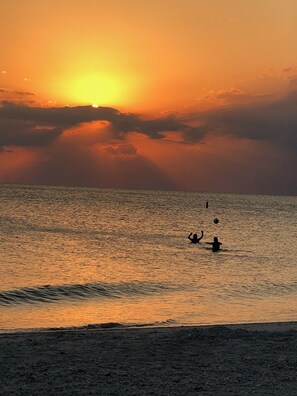 On the beach, sun-loungers, beach towels