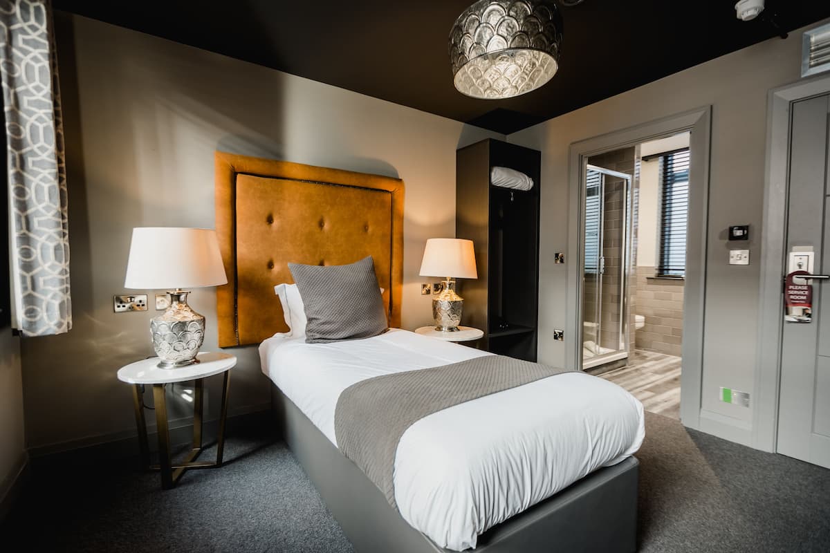 deluxe single room | egyptian cotton sheets, premium bedding, down duvets