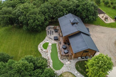 The Gathering Lodge is a relaxing, private log house with a stunning view.