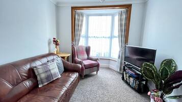 House | Living area | TV, books