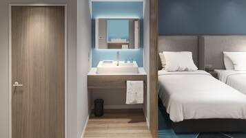 Bruser, brusehoved med spredningseffekt, hårtørrer, håndklæder