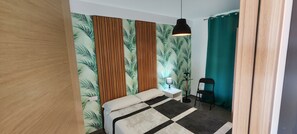 1 slaapkamer, een kluis op de kamer, een strijkplank/strijkijzer