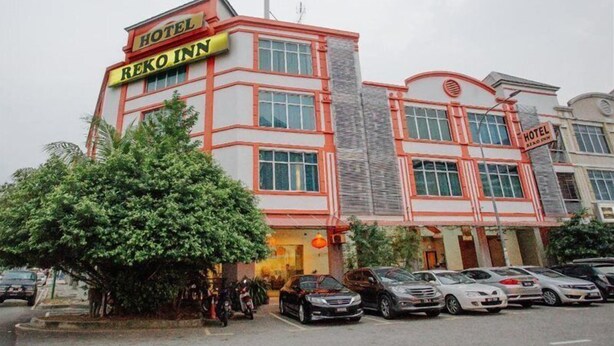A hotel named "REKO INN" with a modern architectural design, featuring multiple windows and a visible entrance. - Hotel Reko Inn (Kajang)
