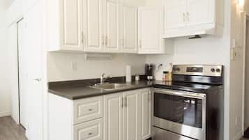 Microwave, coffee/tea maker, toaster, cookware/dishes/utensils