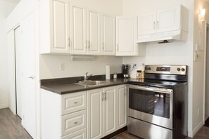 Microwave, coffee/tea maker, toaster, cookware/dishes/utensils