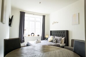 1 bedroom, desk, iron/ironing board, travel cot