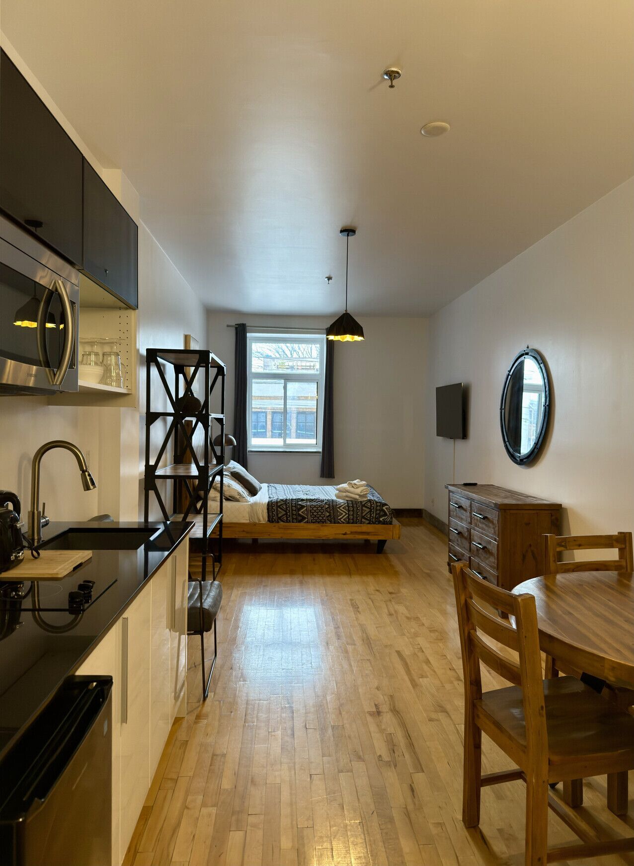 1 bedroom, desk, iron/ironing board, travel crib