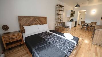 1 bedroom, desk, iron/ironing board, travel crib