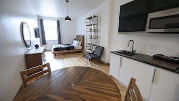 1 bedroom, desk, iron/ironing board, travel cot