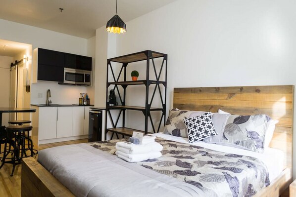 1 bedroom, desk, iron/ironing board, travel cot