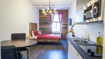 1 bedroom, desk, iron/ironing board, travel crib