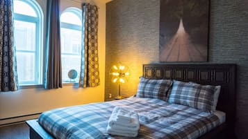 1 bedroom, desk, iron/ironing board, travel crib