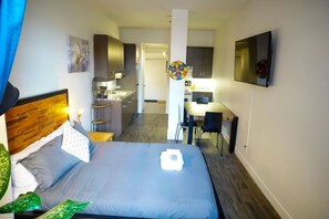 1 bedroom, desk, iron/ironing board, travel cot