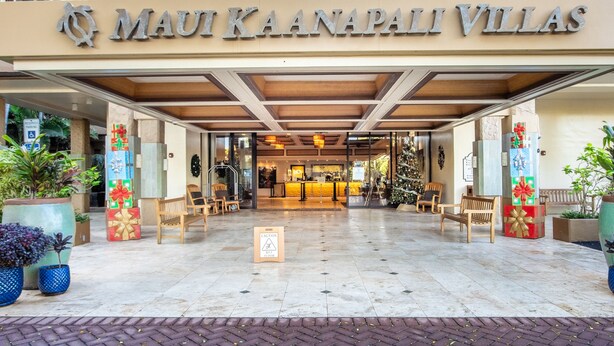 The entrance of Maui Kaanapali Villas with a clear view of the reception area and a tiled pavement. - Stunning ocean views & direct beach access (Lahaina)