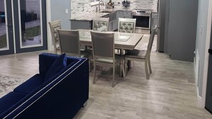 A modern kitchen with a built-in oven and a large window. - Bright & Airy St. Pete Home w/ Outdoor Living (St. Petersburg)
