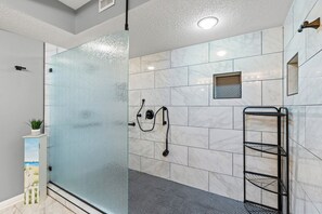 Combined shower/tub, jetted tub
