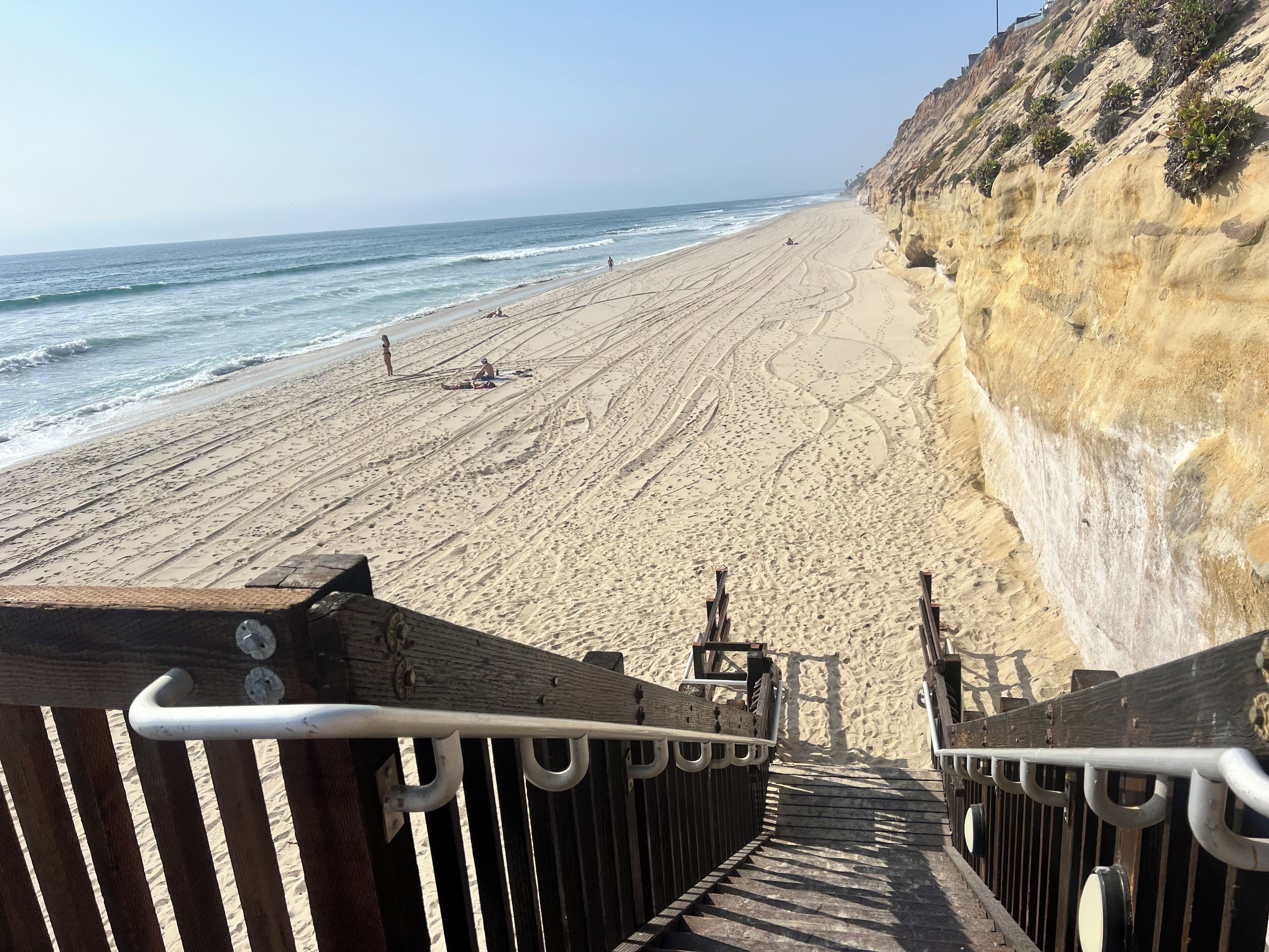 On the beach, sun-loungers, beach towels