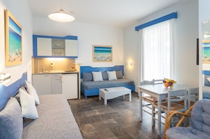 One Bedroom Apartment | Private kitchen | Fridge, stovetop, electric kettle, cookware/dishes/utensils
