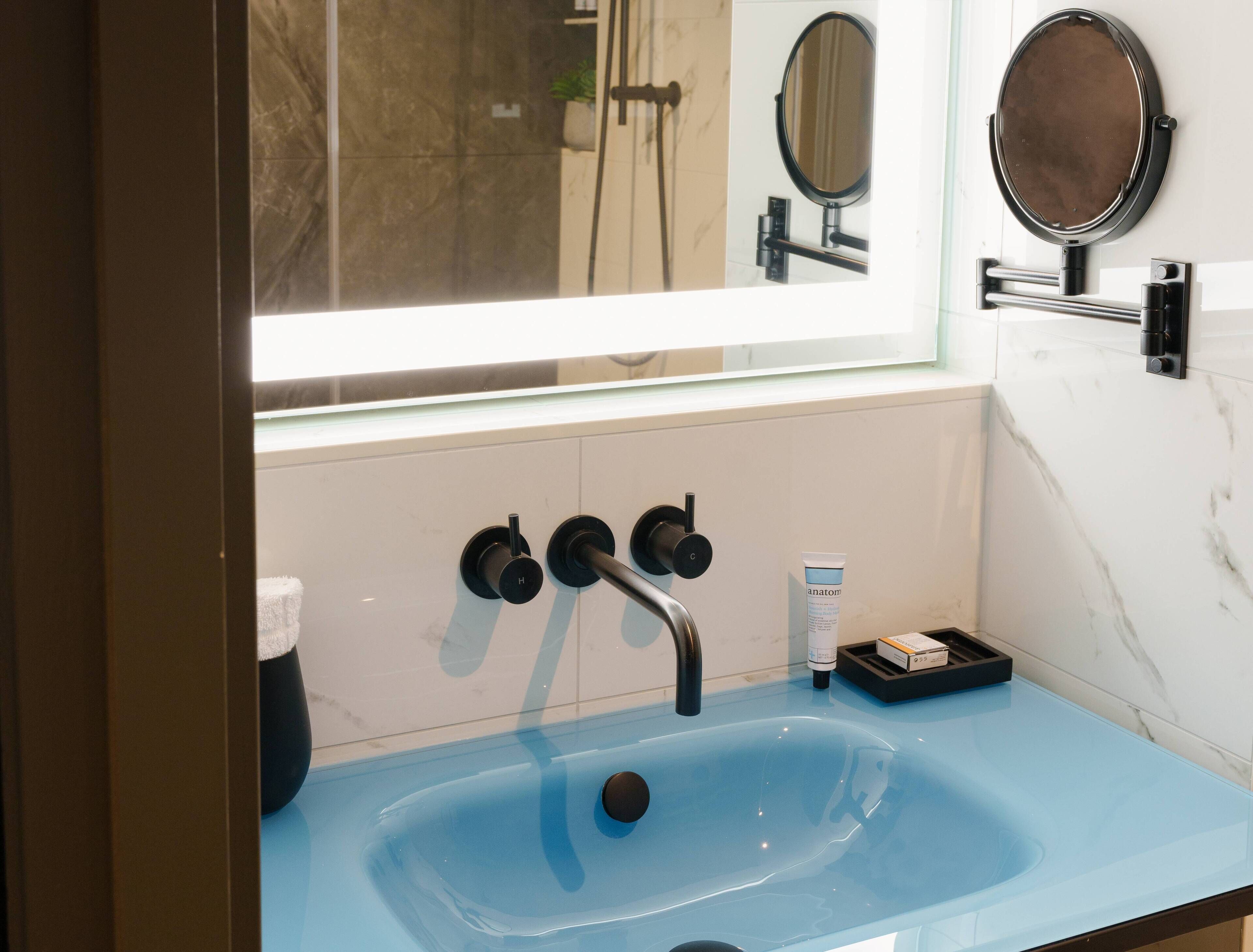 classic room (chic) | bathroom | hair dryer, slippers, towels, soap