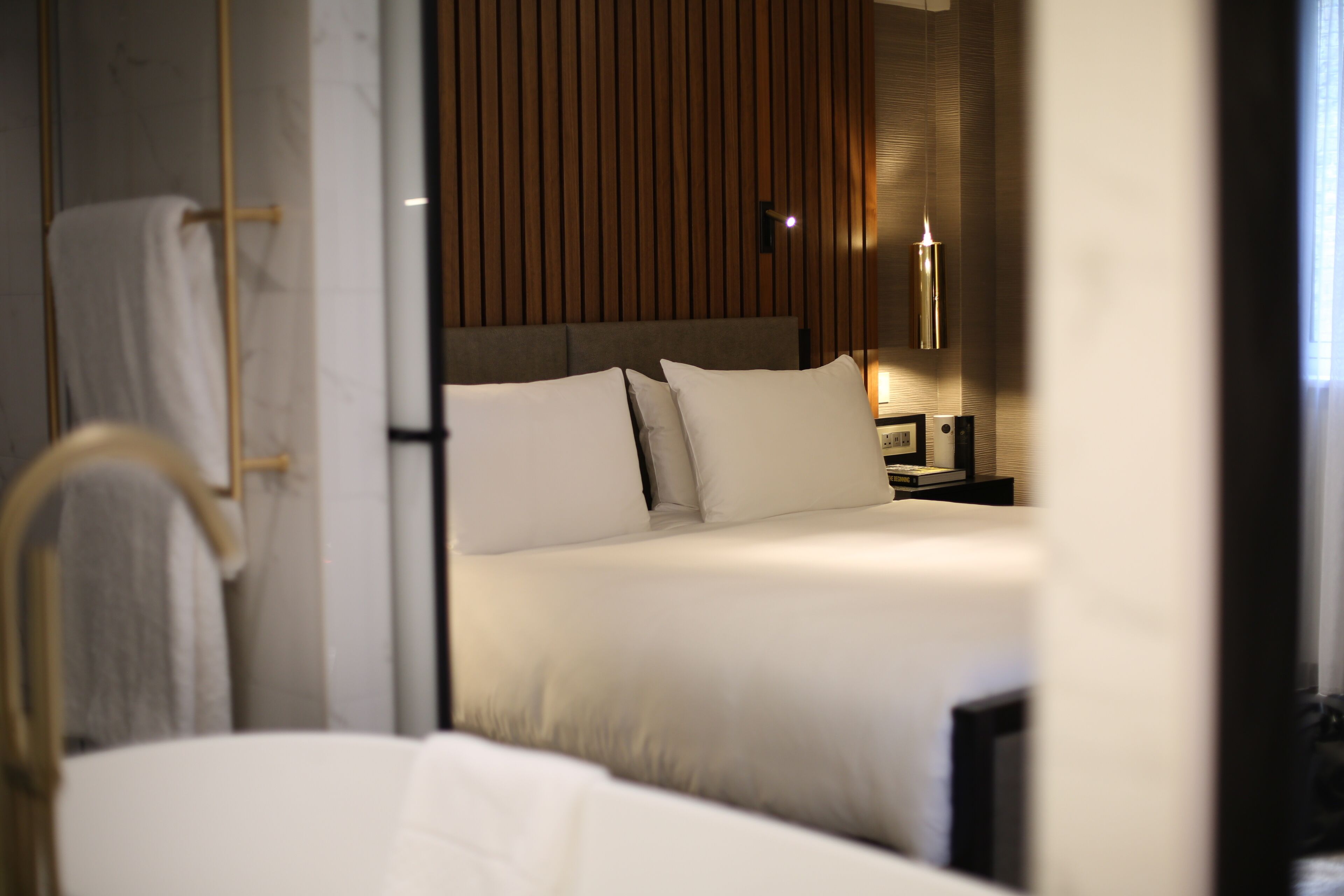 suite | bathroom | hair dryer, slippers, towels, soap