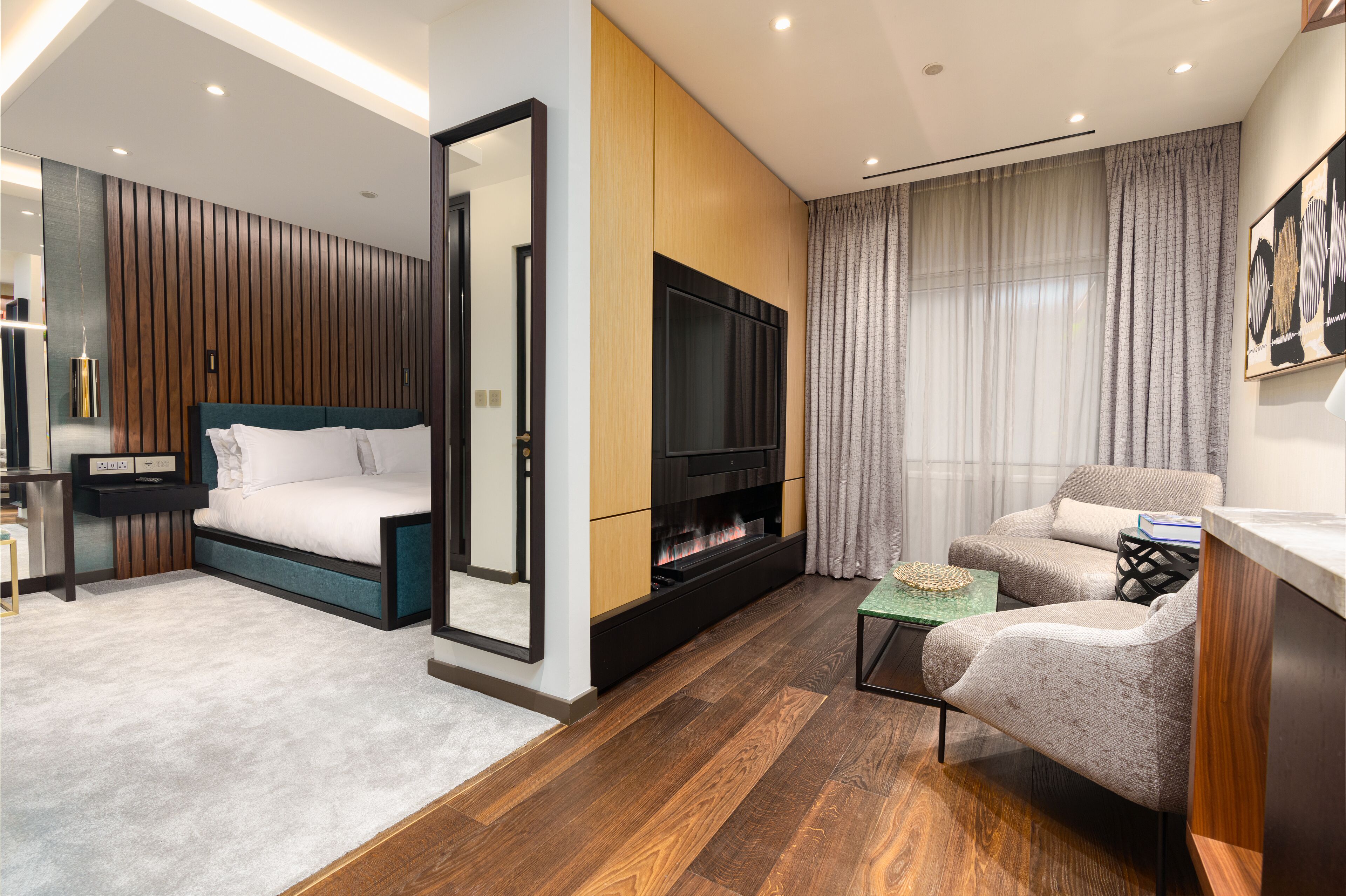 junior suite | living area | 35-inch flat-screen tv with digital channels, tv, ipod dock