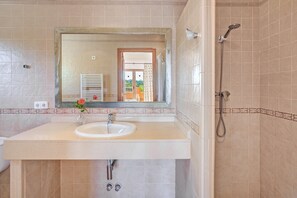 Bathtub, hair dryer, towels