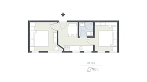 Plano de una habitación de hotel, número 306 Doris, con kitchenette, baño, zona de estar y una cama grande.