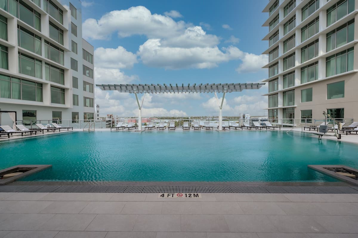 outdoor pool, free pool cabanas, pool umbrellas