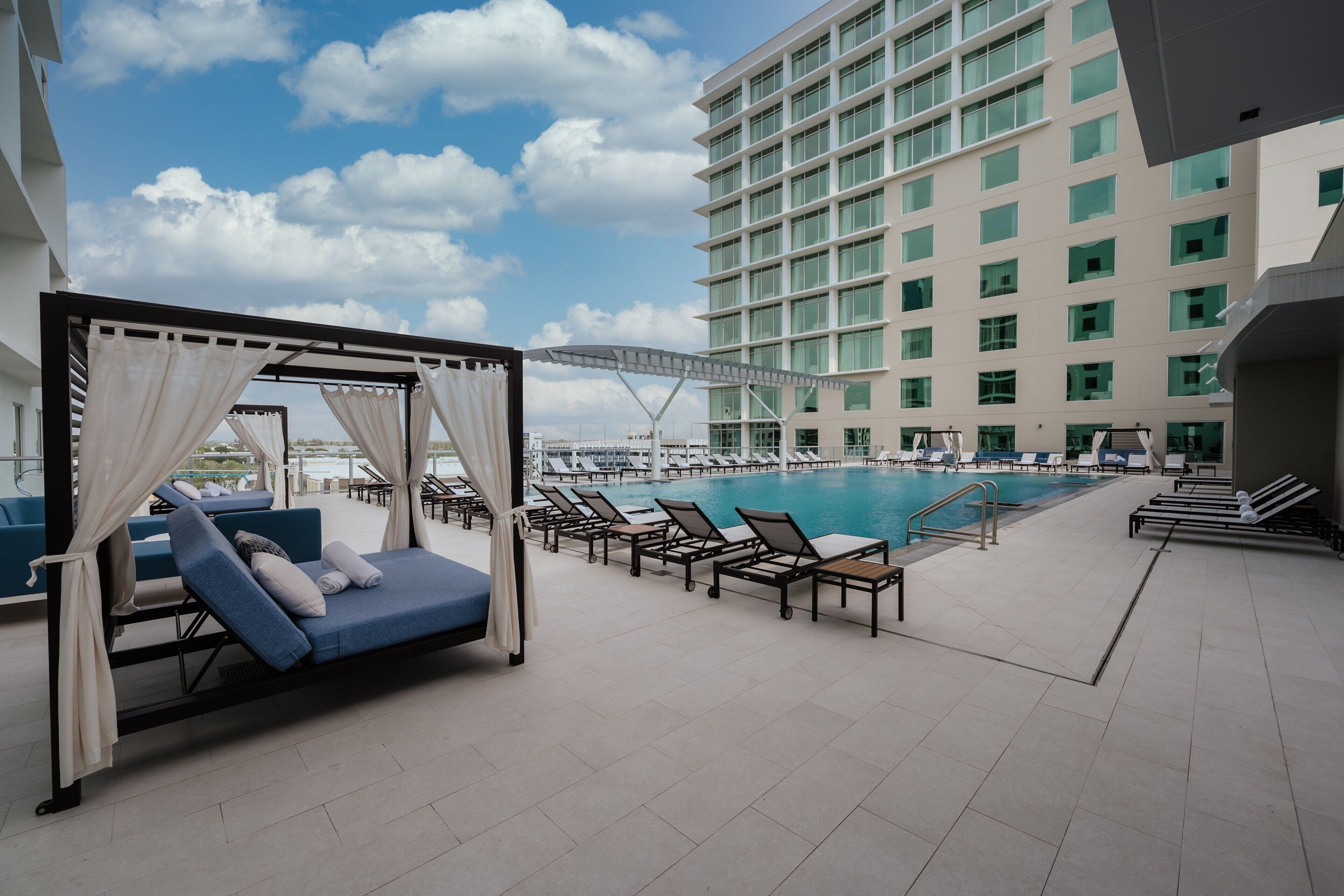 outdoor pool, free pool cabanas, pool umbrellas