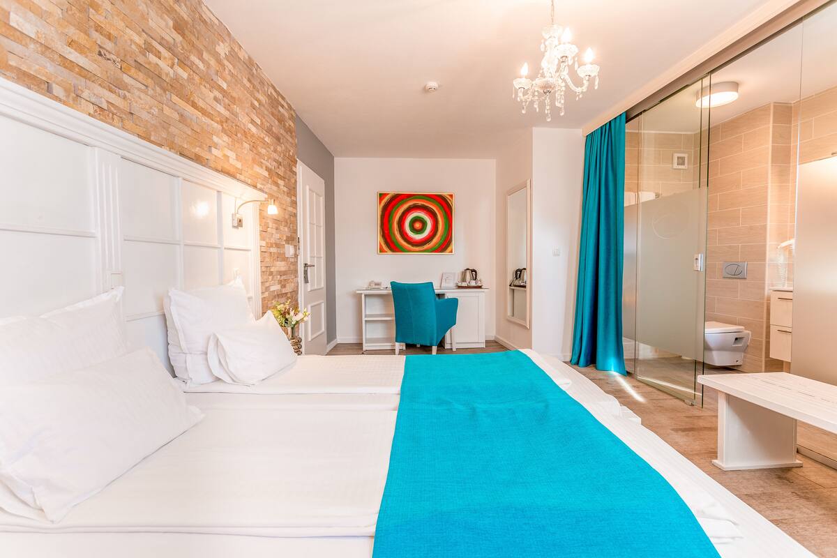 standard double room single use | bathroom | free toiletries, hair dryer, slippers, towels