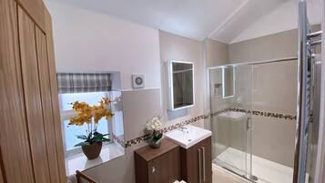 Bathtub, hair dryer, towels, soap