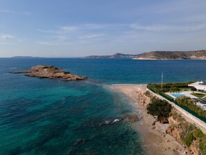 On the beach, sun loungers, beach towels